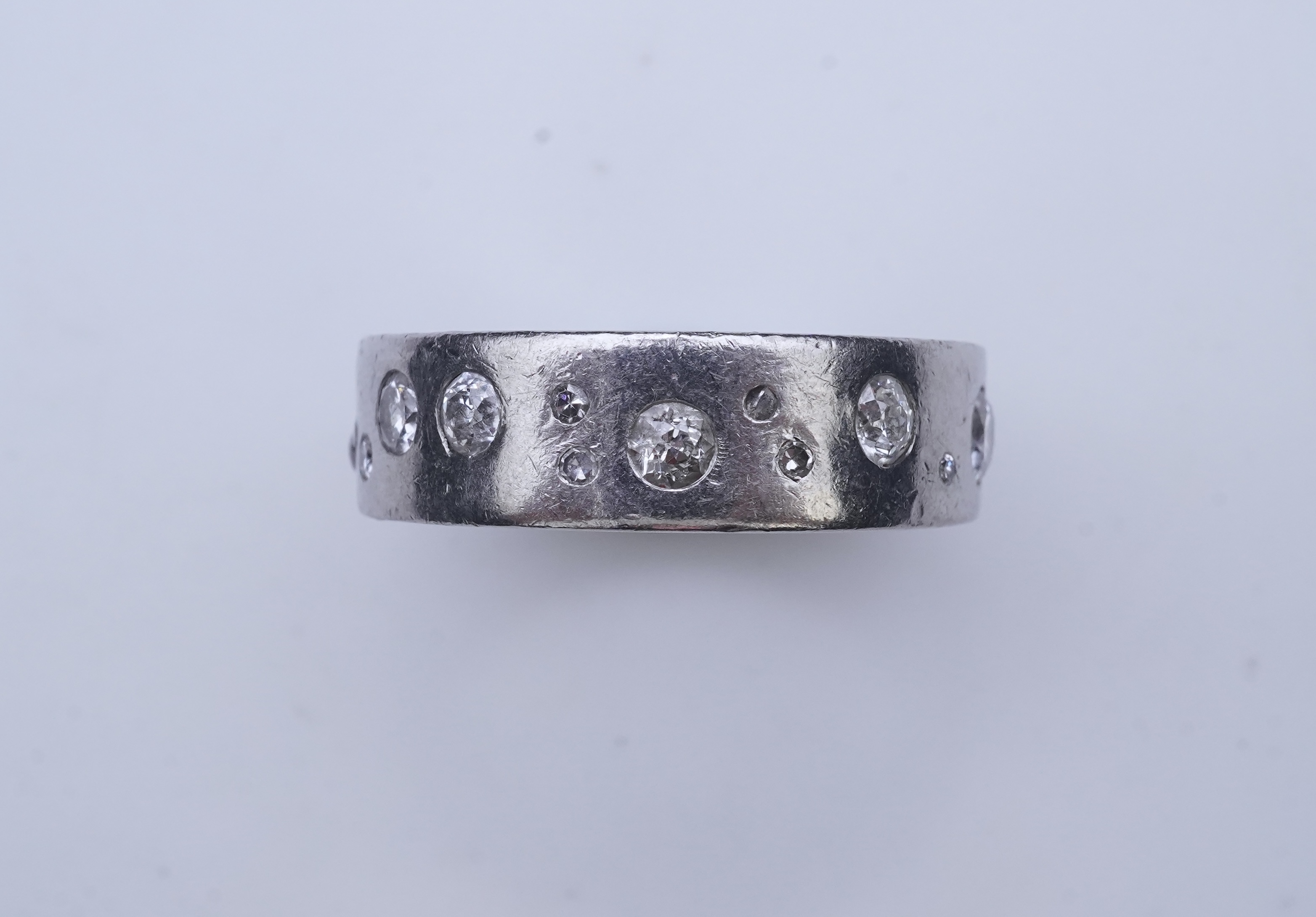 A platinum and diamond eternity ring